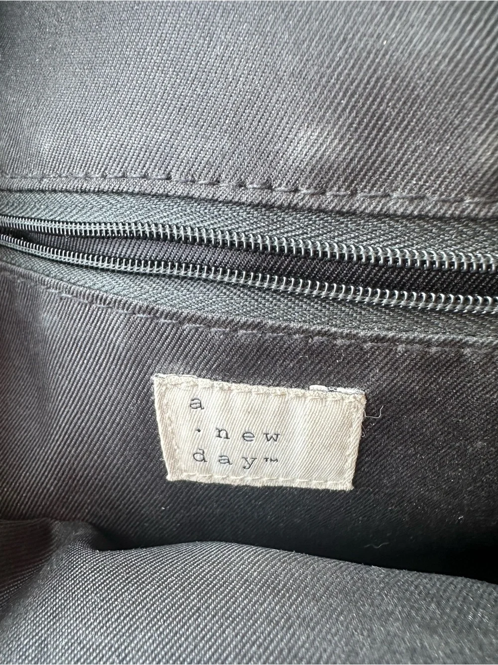 a new day Black Pebble-Textured Leather Backpack Crossbody